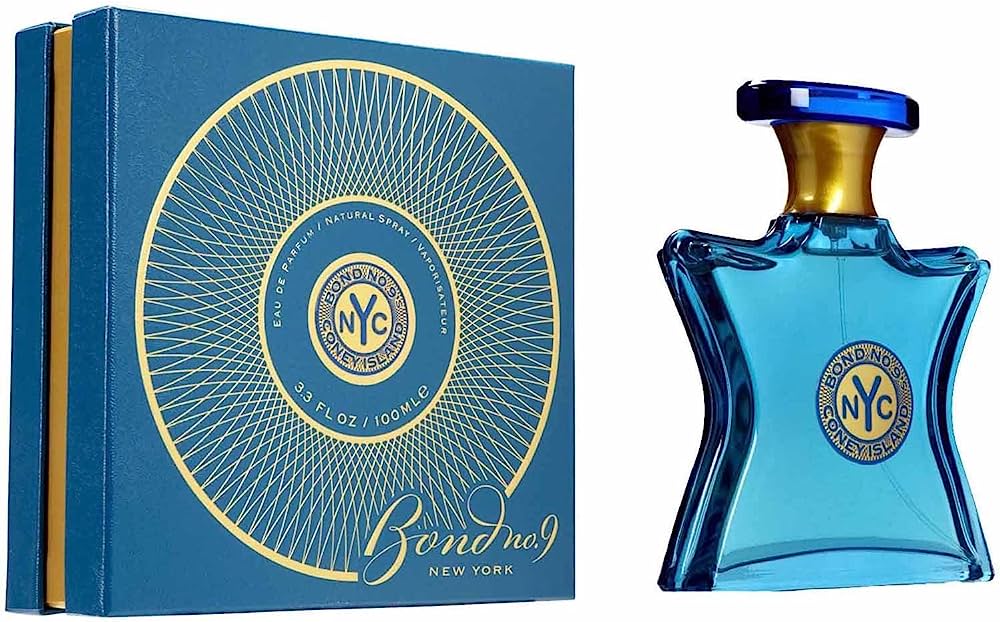 Eau de parfum gift set: teal glass bottle with gold label and matching box