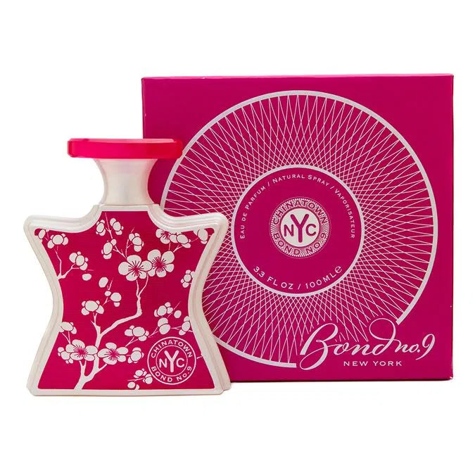 Pink eau de parfum bottle with white floral label and matching Bond No.9 ChinaTown box