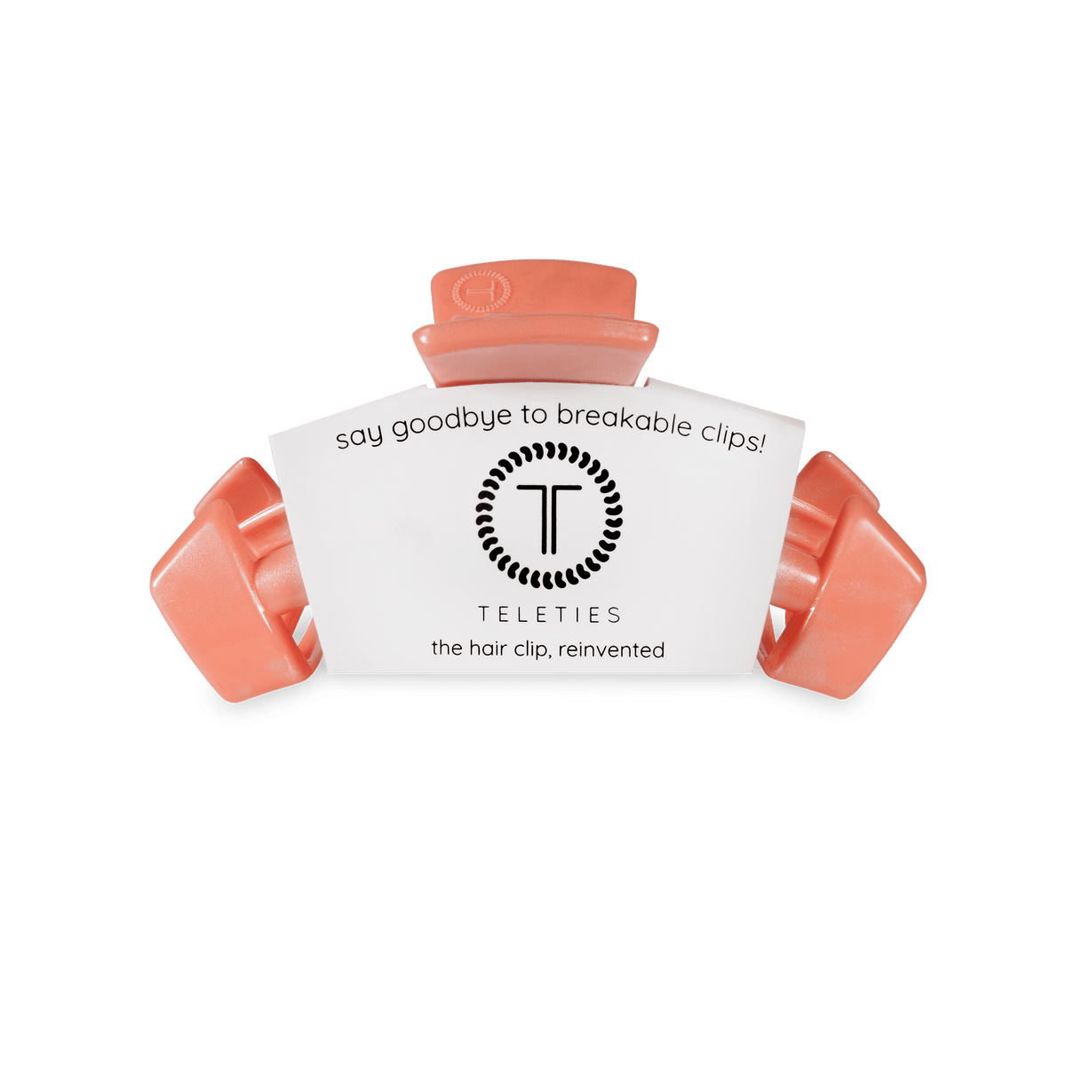 Small coral-orange claw clip with three wide, curved grips.