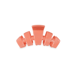 Coral-orange tiny claw hair clip with five prongs