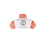Coral-orange tiny claw clip with hair-claw design