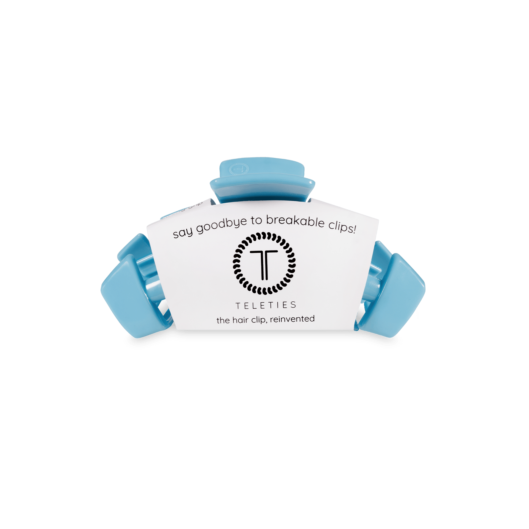 Sky-blue claw hair clip holding a small product label card