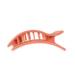 Coral-pink hinged claw hair clip with ridged teeth