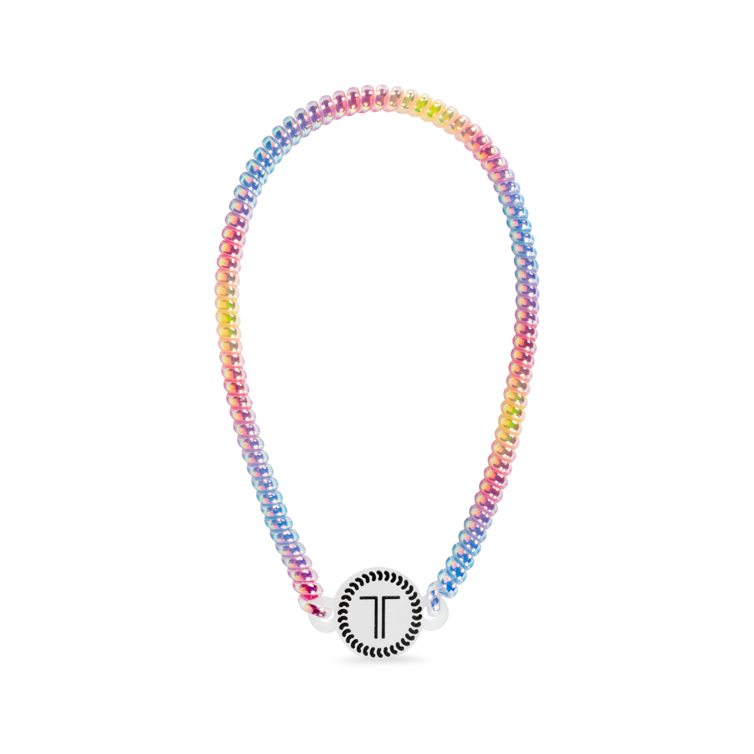 Beaded rainbow headband with round white T charm at front center