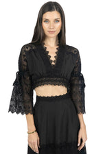 Black lace long-sleeve crop top with deep V neckline and matching maxi skirt set