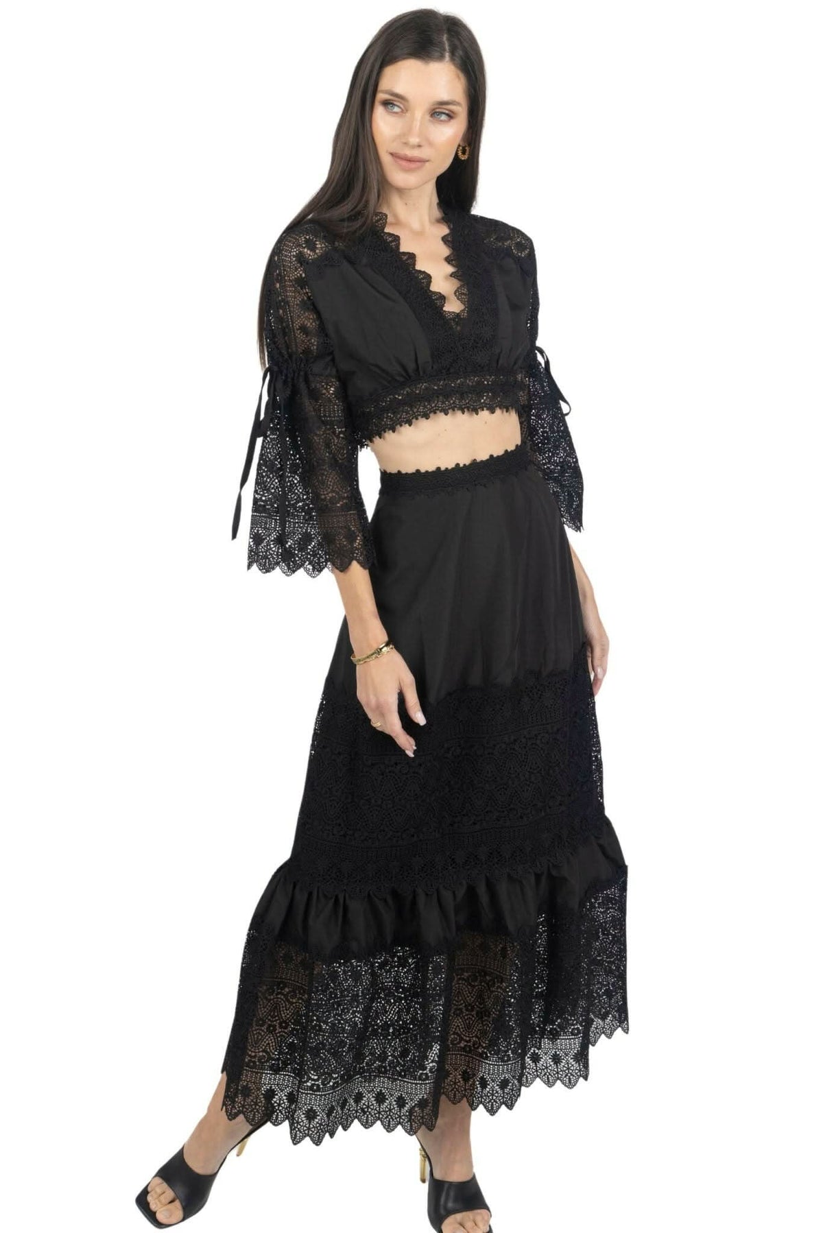 Black lace crop top and maxi skirt set with scalloped trim and flared skirt hem