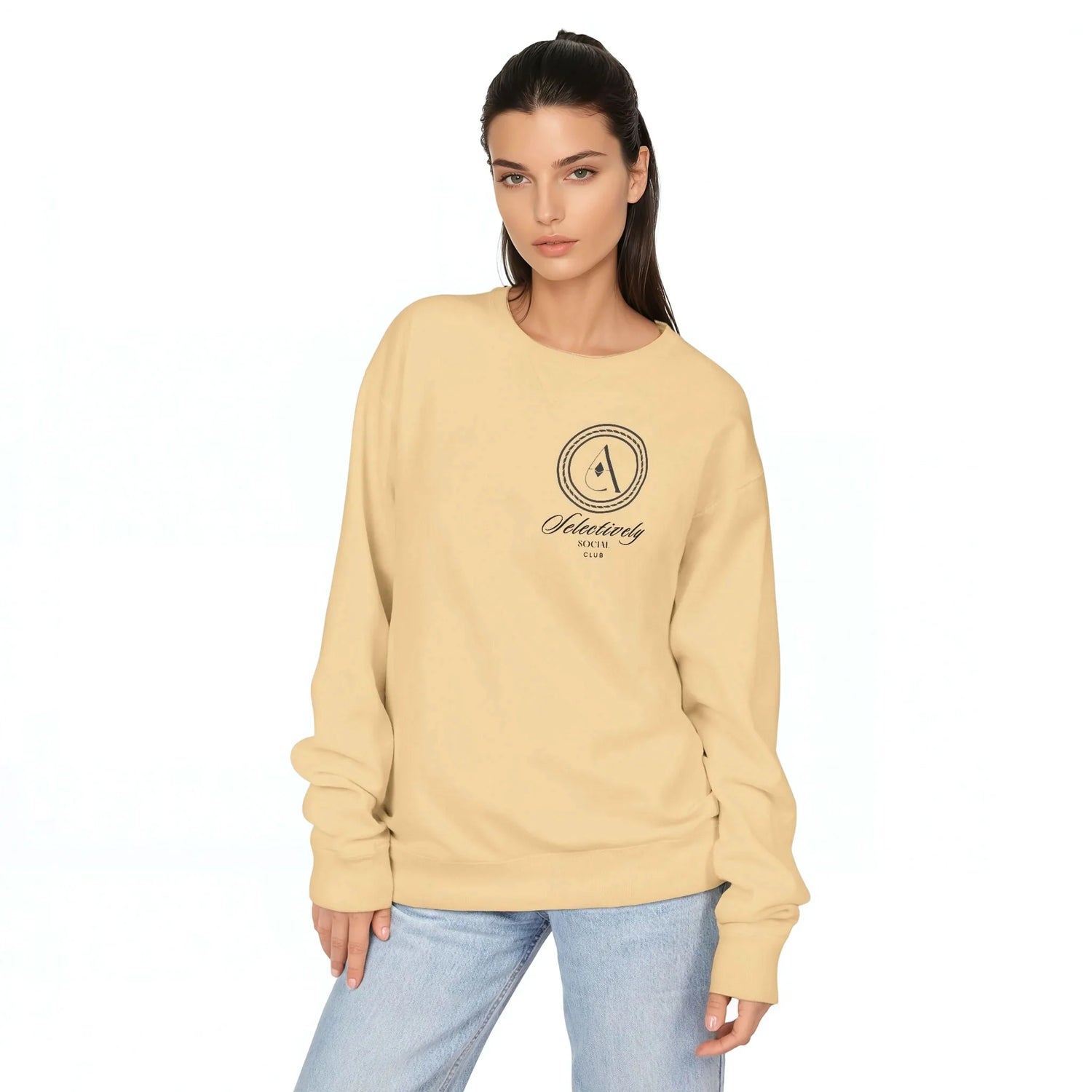 Parchment crewneck sweatshirt with centered circular logo graphic, ribbed cuffs