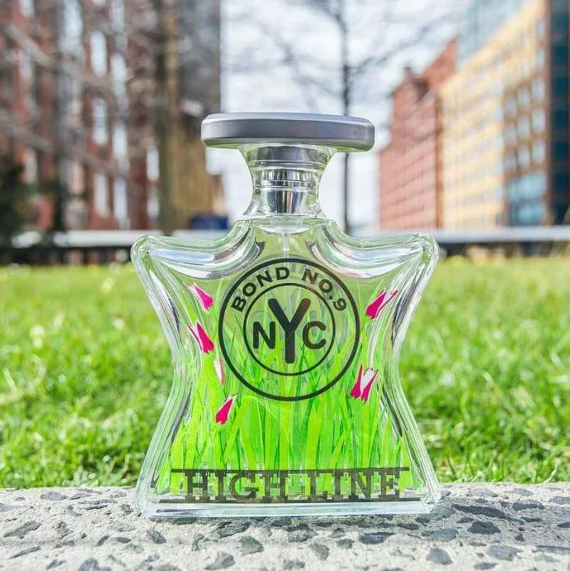 Bond No.9 eau de parfum bottle with green-tinted glass and silver cap
