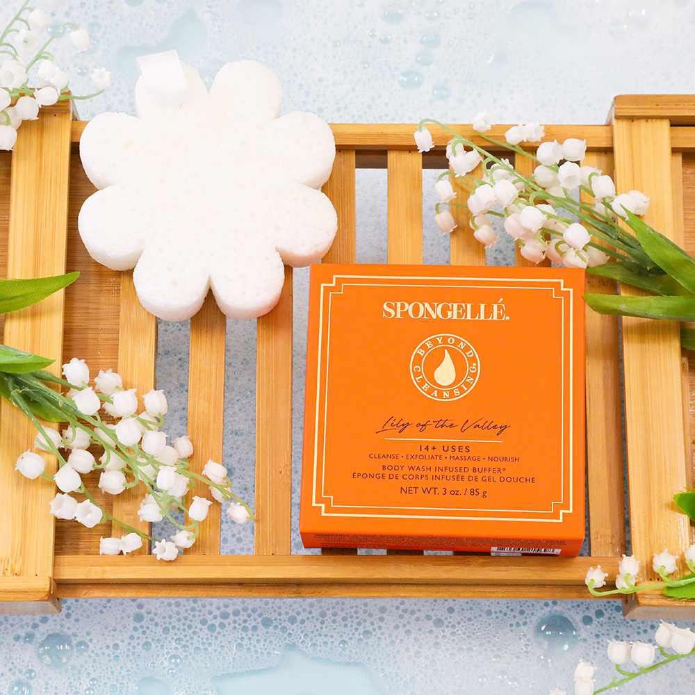 Orange boxed bath sponge with white flower sponges
