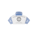 Tiny light blue translucent hair clip with branded card backing