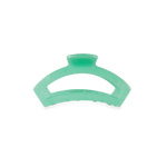 Tiny mint-green open spring hair clip with hinged bar.