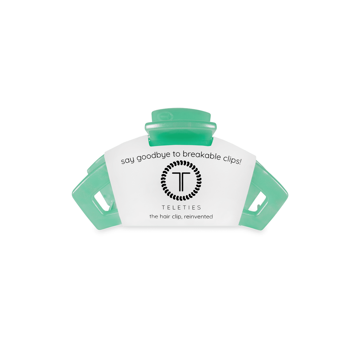 Mint-green open spring hair clip on a branded Teli ties backing card.