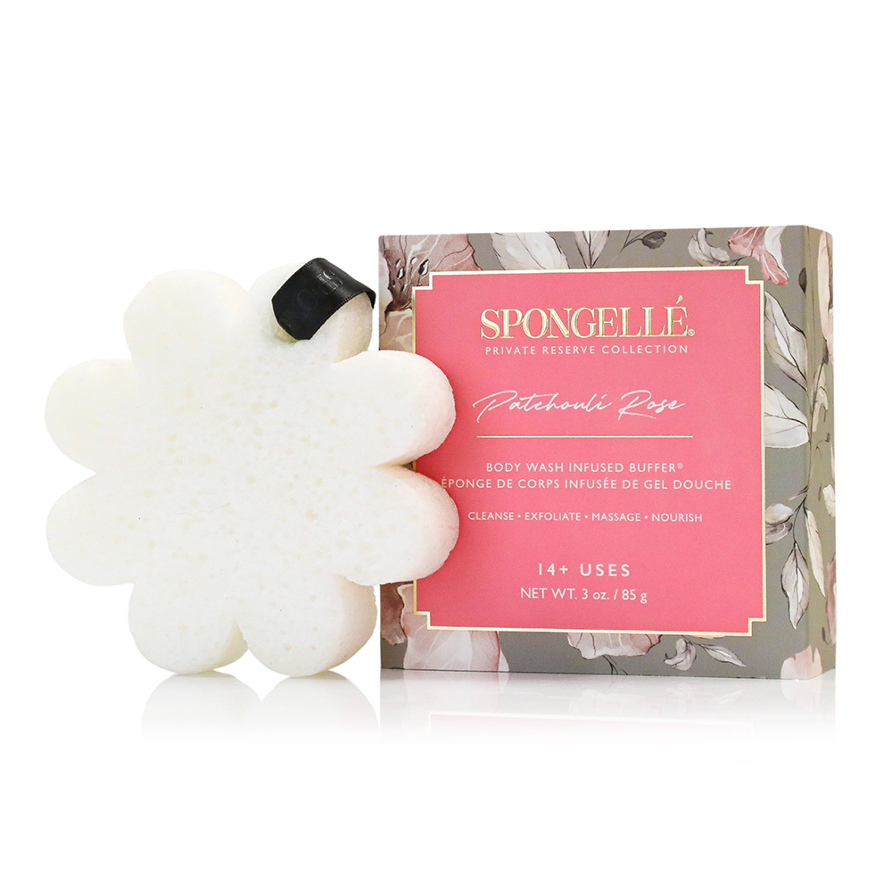 Packaged flower-shaped body buffer with white sponge and black ribbon, plus pink box