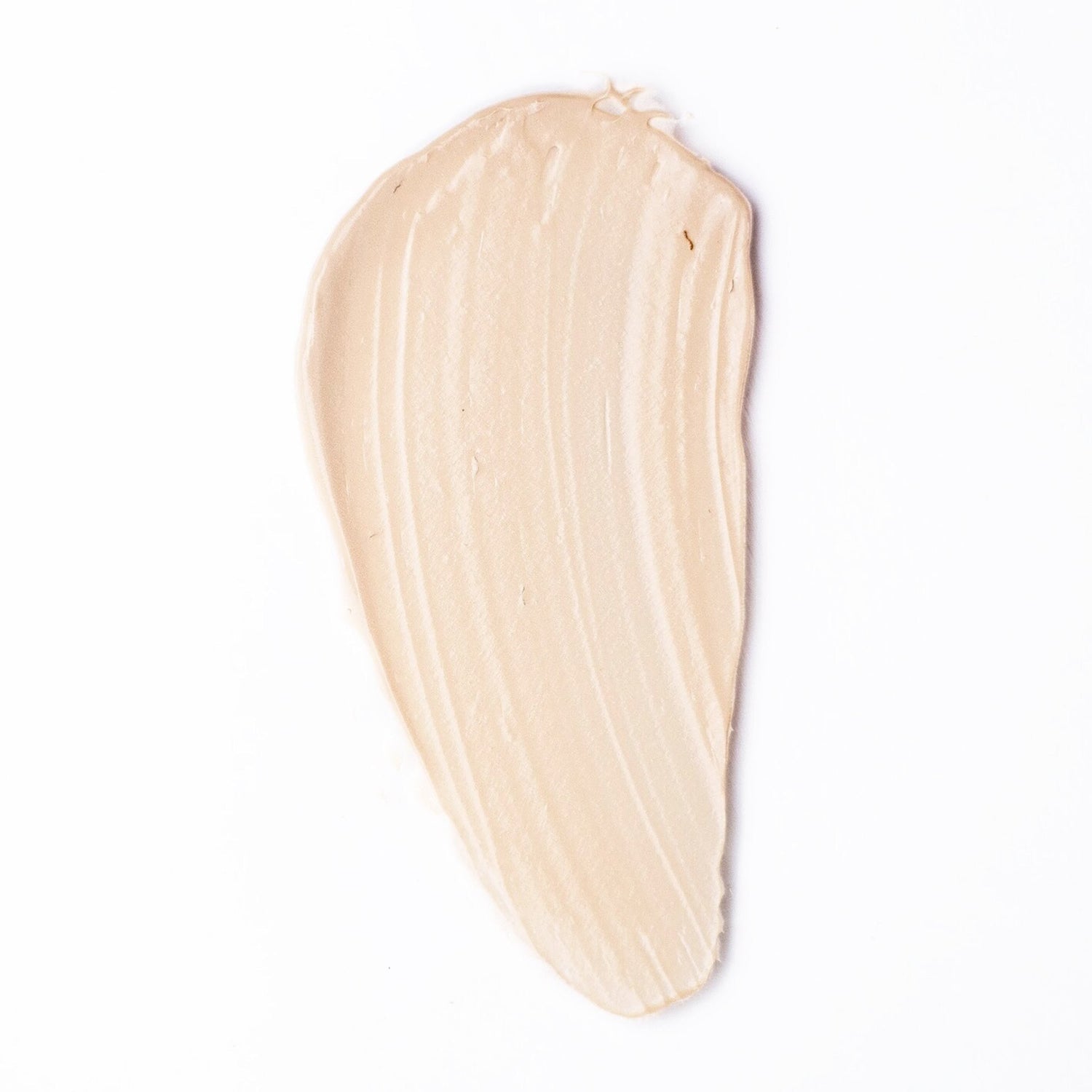 Light beige tone-up primer swatch on teardrop applicator