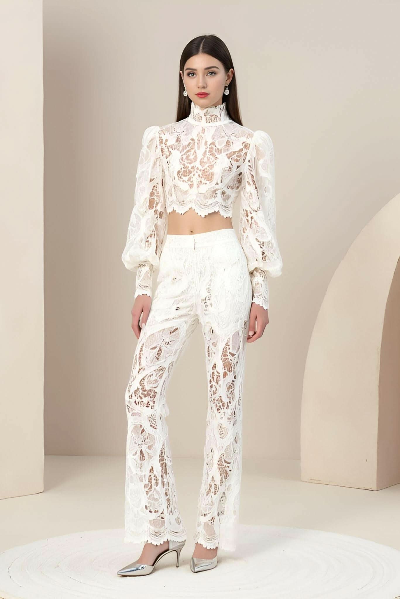 White guipure lace top and matching lace pants set, cropped long sleeves.