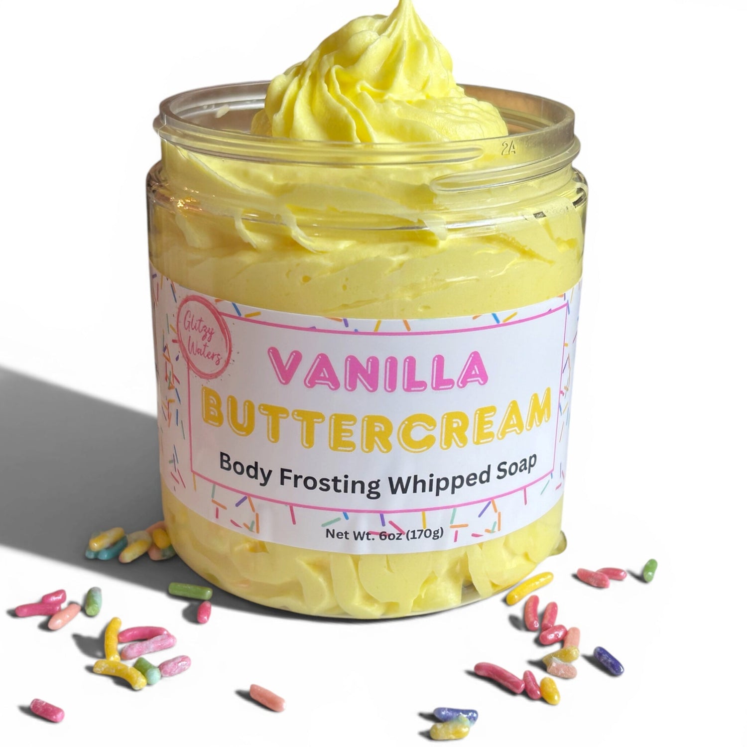 Vanilla buttercream body frosting whipped soap jar with yellow swirl, label, and sprinkles