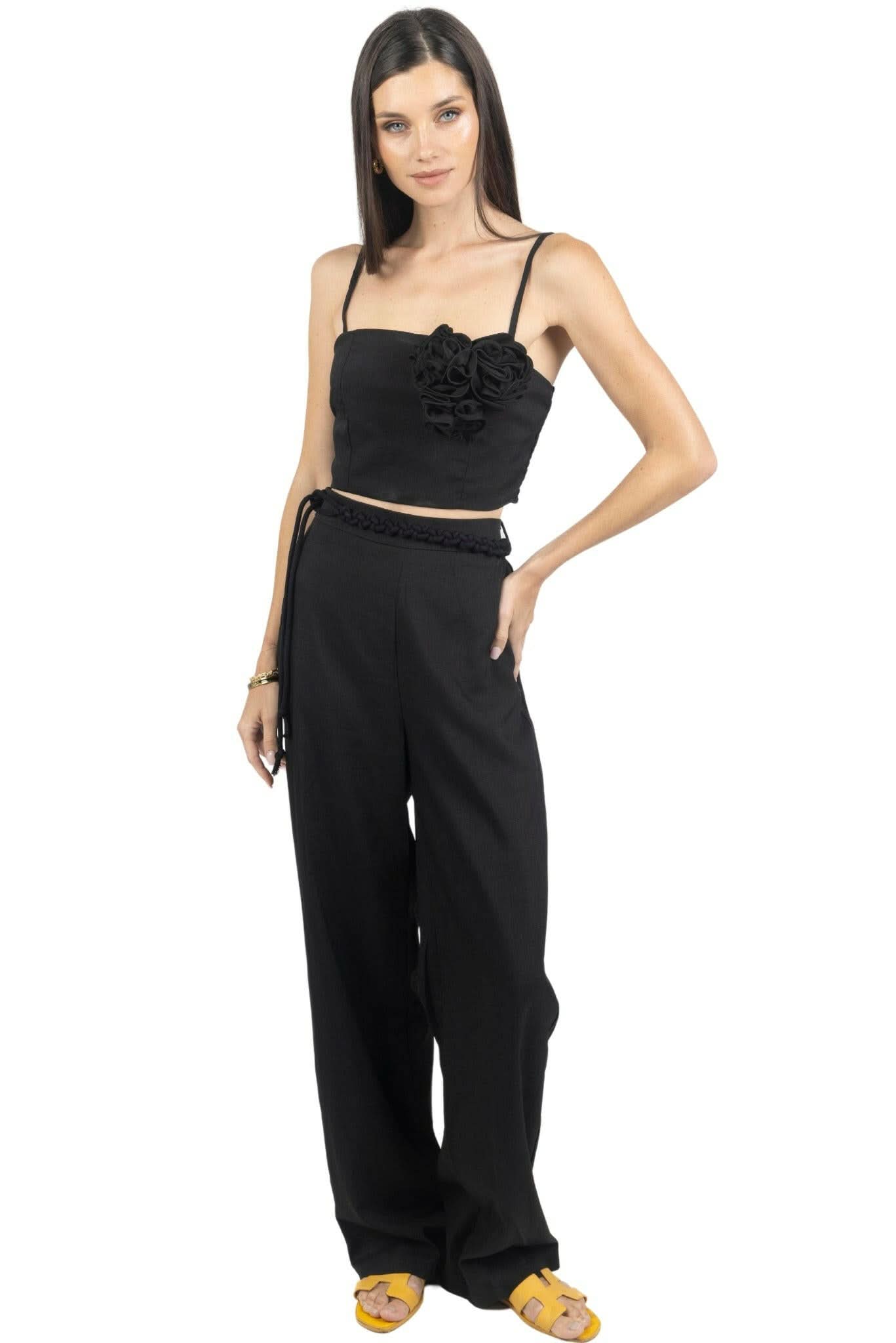 Black two-piece set with cropped cami top and wide-leg pants
