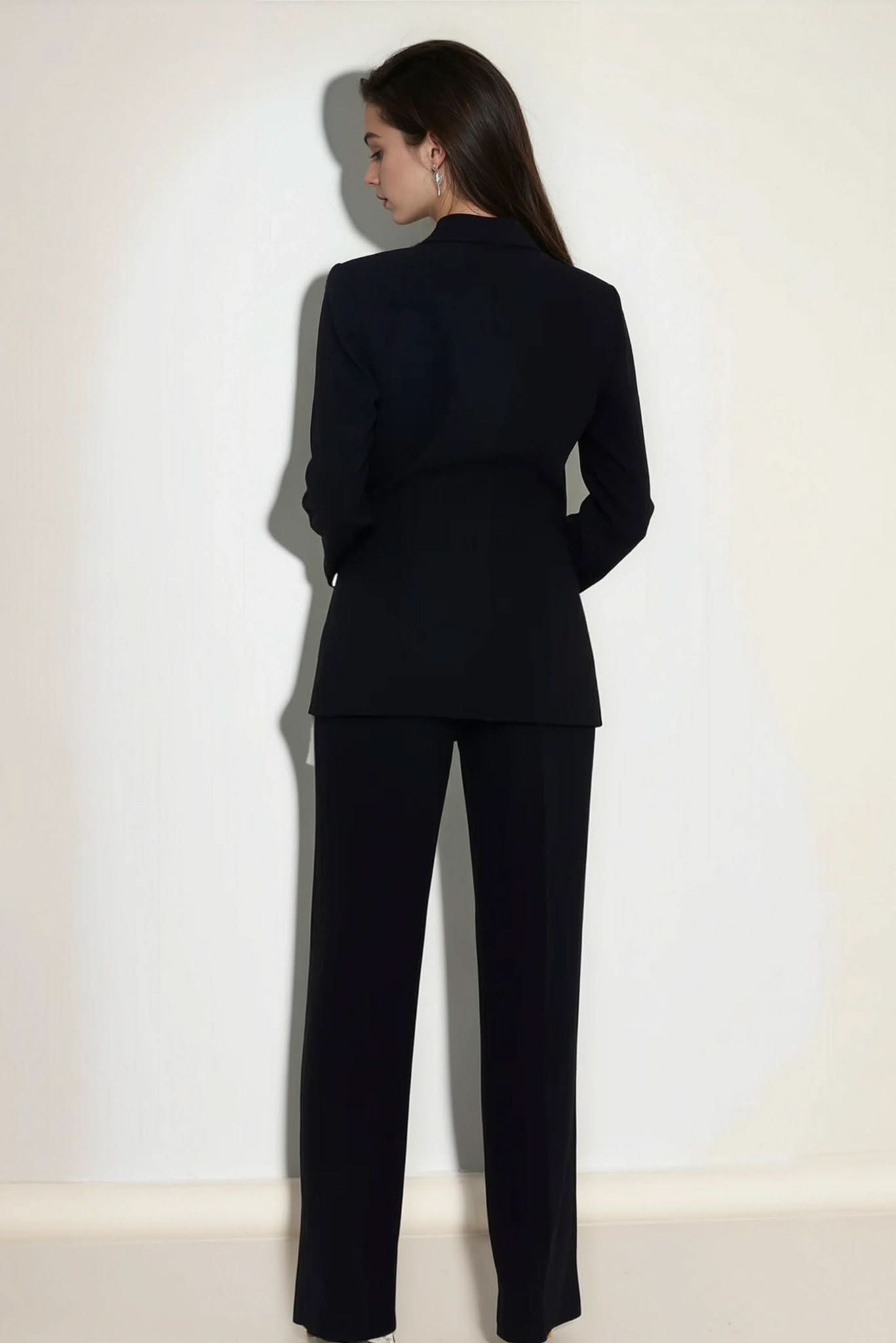 Dark straight-leg tailored pants with ankle-length straight cut, back view