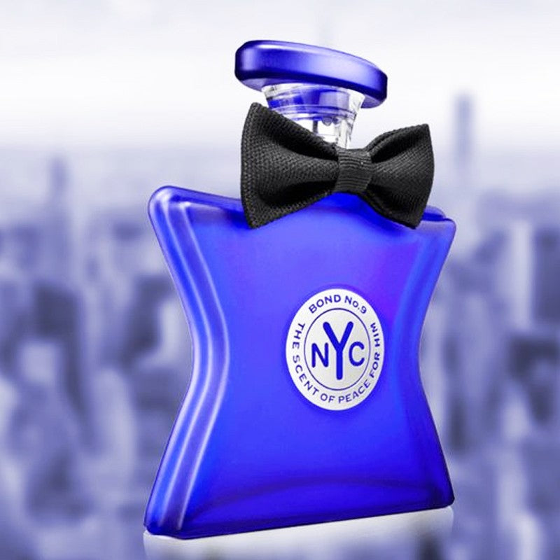 Bond No. 9 blue eau de parfum bottle with black bow and NYC logo medallion