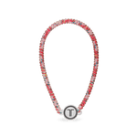Beaded headband in pink, blue, and silver with a round black charm