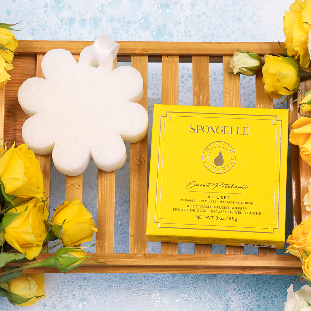 Boxed flower body sponge and cleaning buffer with Sweet Patchouli label