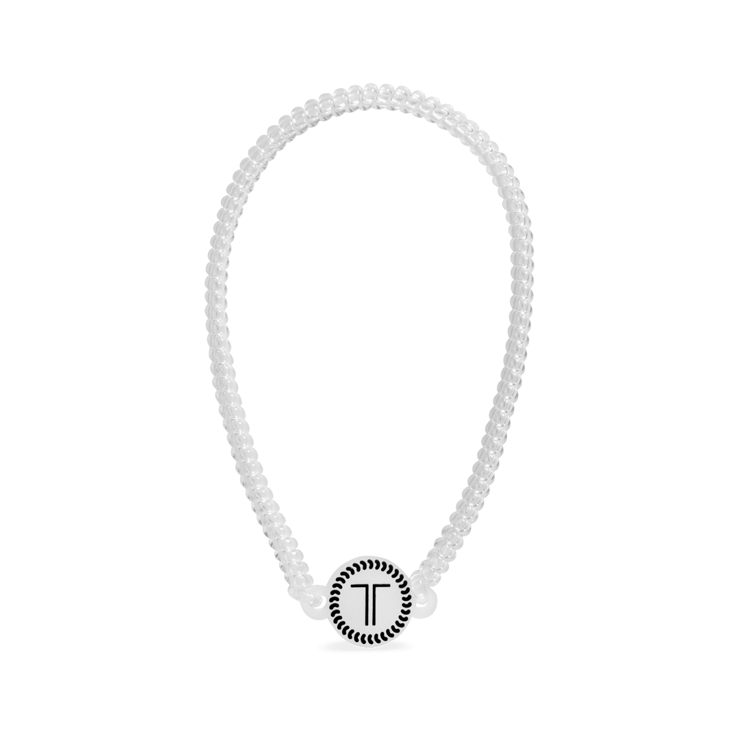 Clear spiral coil headband with round T logo charm