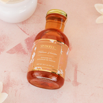 SPONGELLE tobacco vanilla diffuser oil bottle, amber glass with gold screw cap