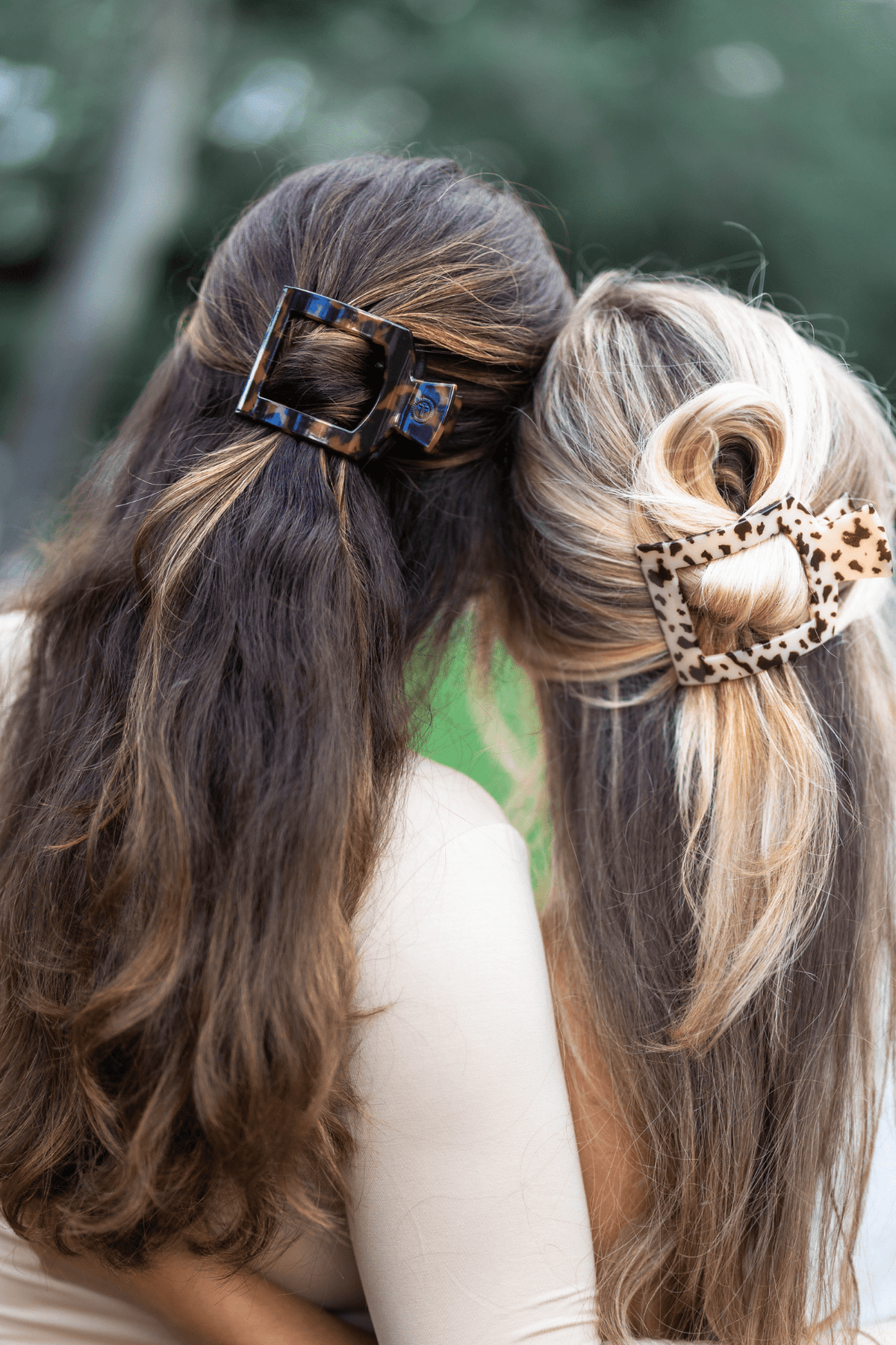 Medium tortoiseshell flat square hair clip holding hair side section