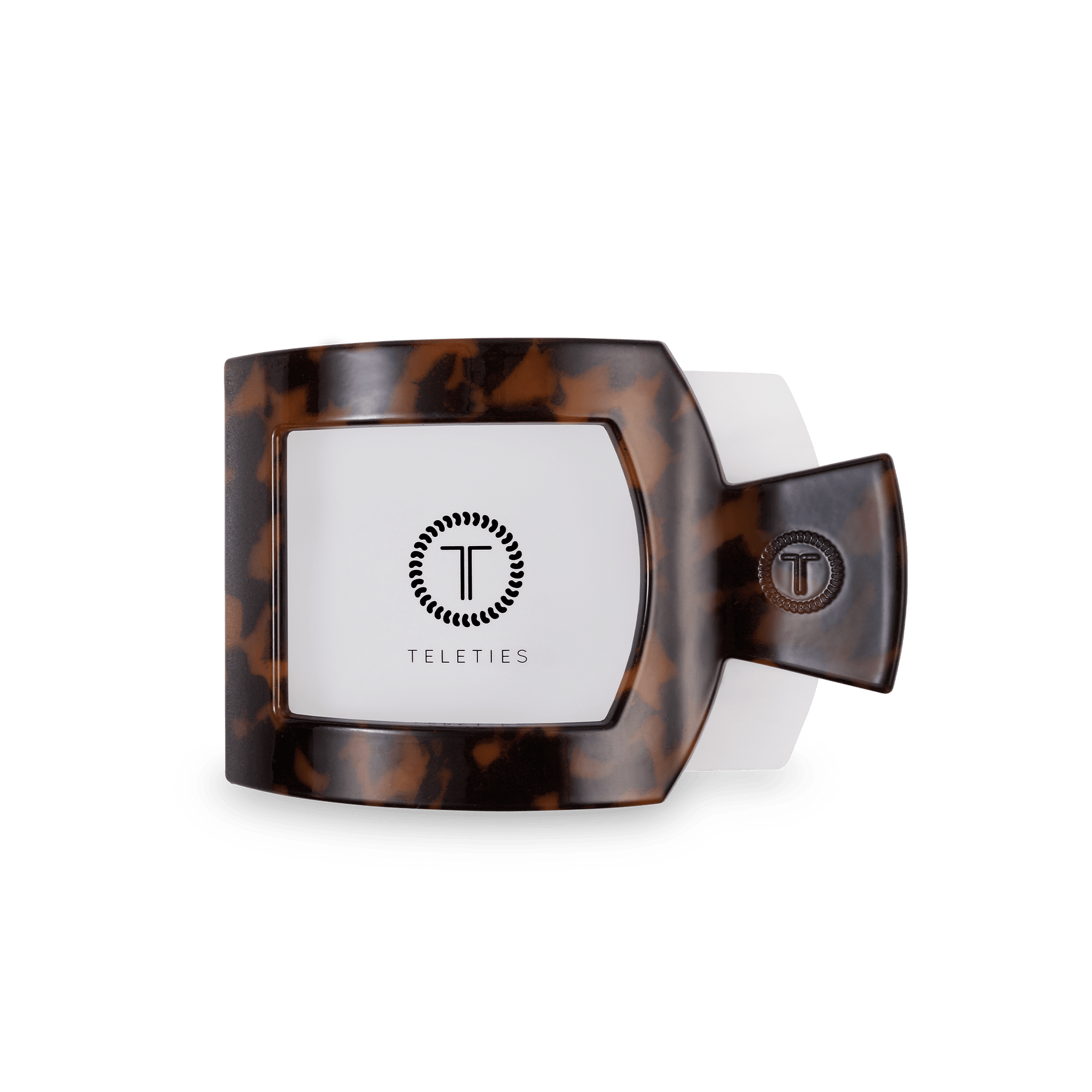 Medium tortoiseshell flat square hair clip with brand logo on white panel