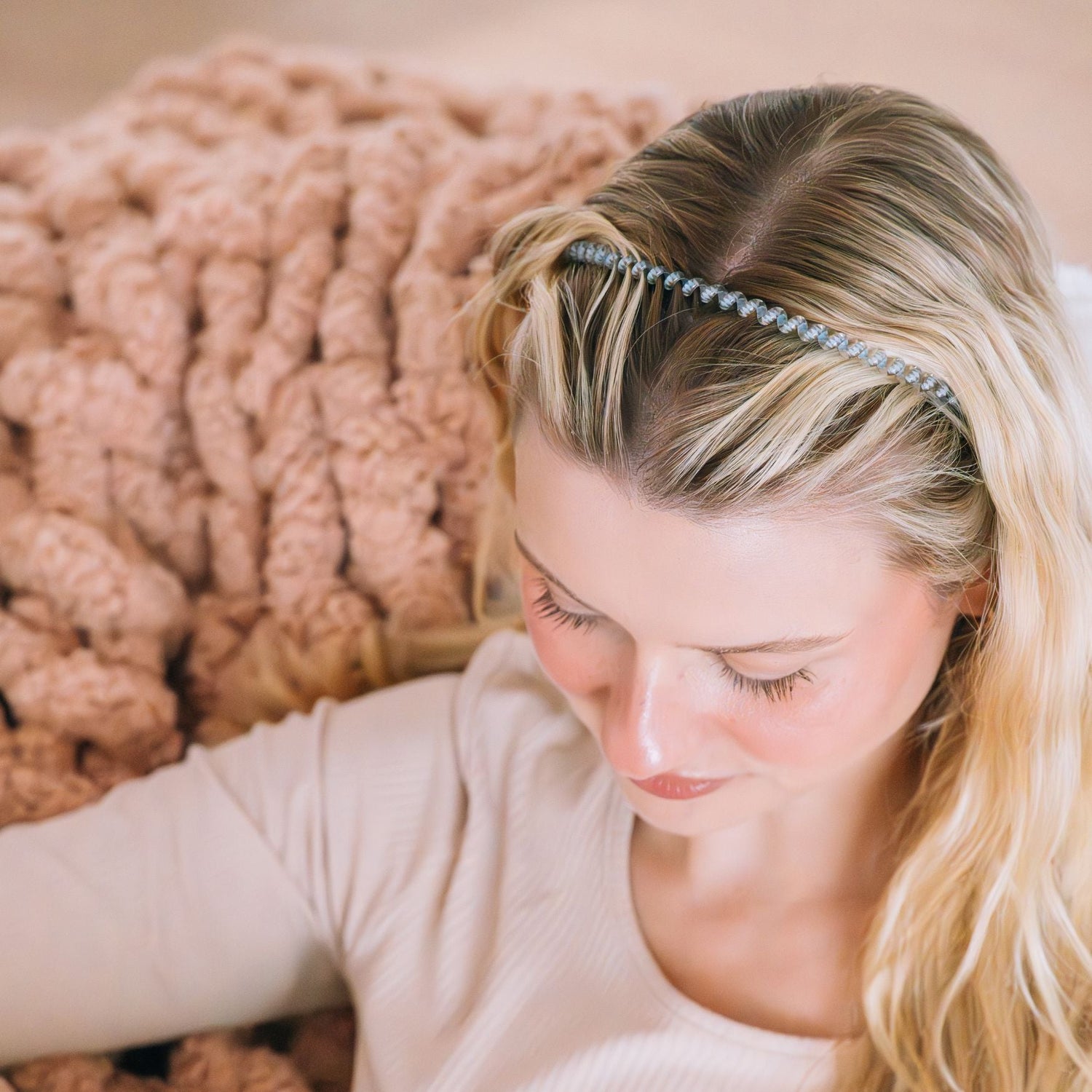 Taupe beaded headband with T charm worn in blonde ponytail
